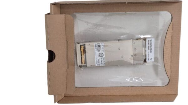 Network module inside a cardboard packaging.