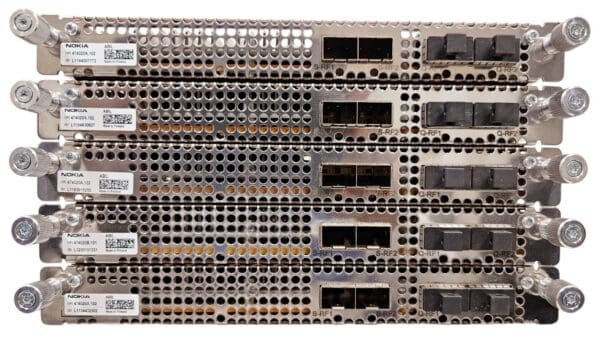 Four stacked Nokia network devices with ports.